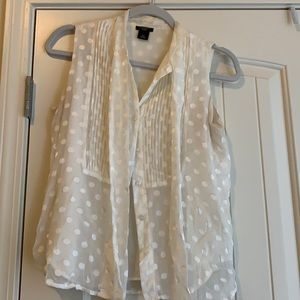 Ann Taylor White sleeveless dress shirt.